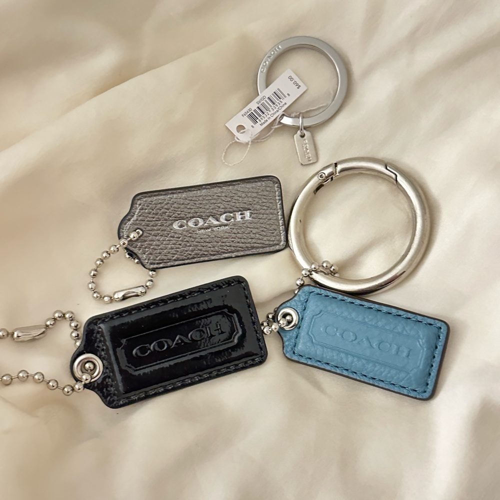 Four Coach Bag Tag Keychains